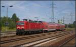 DB Regio 143 589-0 mit der RB14 aus Senftenberg zum Endhalt am 23.07.2012 in Berlin Schnefeld Flughafen