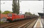 DB Schenker 152 096-4 mit einem kurzen Gterzug bei tristem Wetter am 12.09.2012 in Berlin-Karow