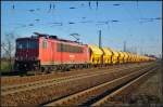 DB Schenker 155 065 mit Tds-Wagen der Fa.