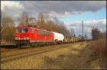 DB Schenker 155 036 mit einem gemischten Gterzug am 22.02.2014 durch Leipzig-Thekla