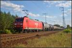 DB Schenker 145 013-9 fuhr mit einem Kesselwagen-Zug am 28.08.2014 durch die Berliner Wuhlheide