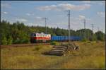 DB Schenker 232 045-5 mit Eaos-Wagen von PKP Cargo und Erz am 28.08.2014 durch die Berliner Wuhlheide nach B.-Moabit