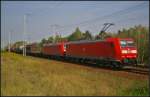 DB Schenker 185 194-8 mit Wagenlok 145 008 und einem kurzen Gterzug am 16.09.2014 durch die Berliner Wuhlheide