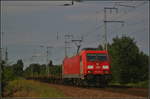 DB Cargo 185 403-3 fuhr mit leeren Wagen der Gattung Lgs 580 am 09.07.2017 durch die Berliner Wuhlheide.