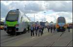 Die von Stadler an bls und ODEG ausgelieferten Versionen des Doppelstocktriebzug KISS auf der InnoTrans 2012 in Berlin