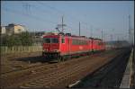 DB Schenker 155 149-8 und kalt 155 028-4 kommen bei schönstem Winterwetter durch Britz in der Uckermark gefahren (gesehen 26.02.2011)    Update: 155 149 am 20.07.2015 verschrottet in Opladen